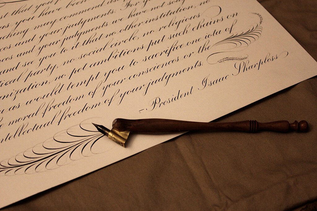 A sample of copperplate scrip with an oblique pen holder.